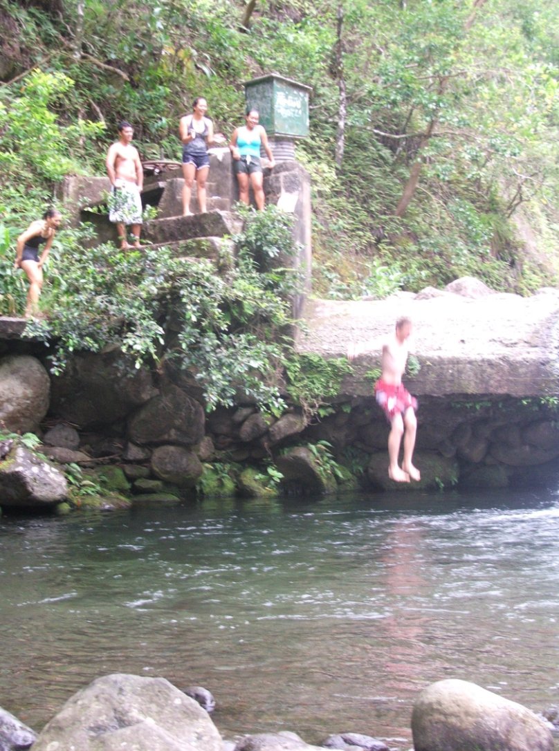 Tristan jumping into the pool